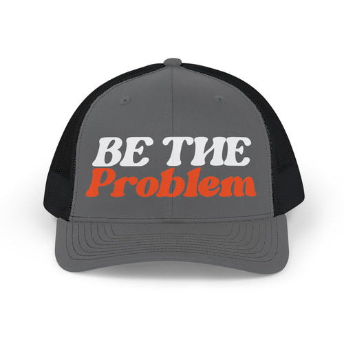 Be The Problem Trucker Cap